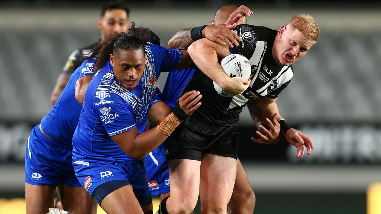 Griffin Neame of New Zealand Kiwis runs past the Samoan defence. Picture: NRL Imagery