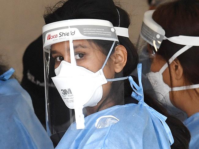 BRISBANE, AUSTRALIA - NewsWire Photos - SEPTEMBER 30, 2021.Health workers perform duties at a drive through Covid-19 testing clinic at Murarrie in Brisbane. Picture: NCA NewsWire / Dan Peled