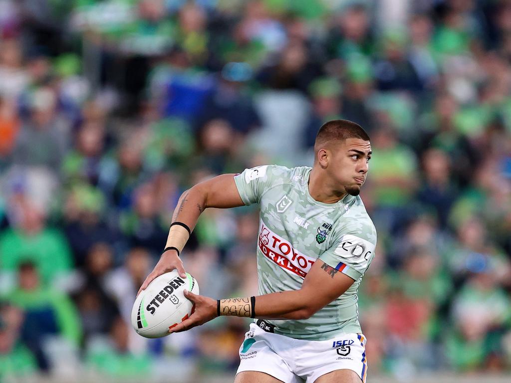 CANBERRA, AUSTRALIA - APRIL 28: Trey Mooney of the Raiders passes the ball to a teammate during the round eight NRL match between Canberra Raiders and Cronulla Sharks at GIO Stadium, on April 28, 2024, in Canberra, Australia. (Photo by Brendon Thorne/Getty Images)