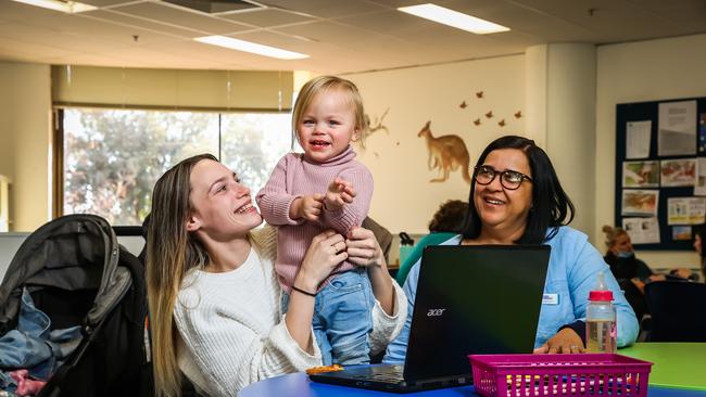 Christies Beach High School student Yasmin with her daughter Isla, 2, and proud teacher Del Brownridge. Picture: Tom Huntley