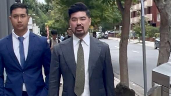 Seyla Lao (left) with his lawyer (right) outside Burwood Local Court.