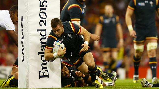 CARDIFF, WALES - OCTOBER 01: Gareth Davies of Wales scores a try during the 2015 Rugby World Cup Pool A match between Wales and Fiji at the Millennium Stadium on October 1, 2015 in Cardiff, United Kingdom. (Photo by Michael Steele/Getty Images)