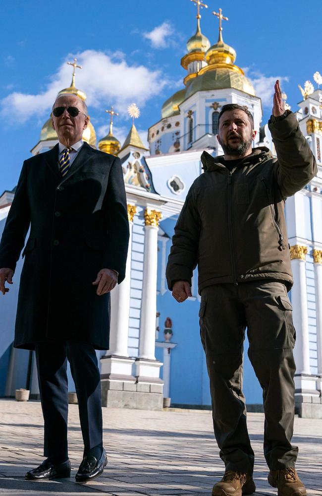US President Joe Biden walks with Ukrainian President Volodymyr Zelenskyy as air raid sirens wail. Picture: Evan Vucci
