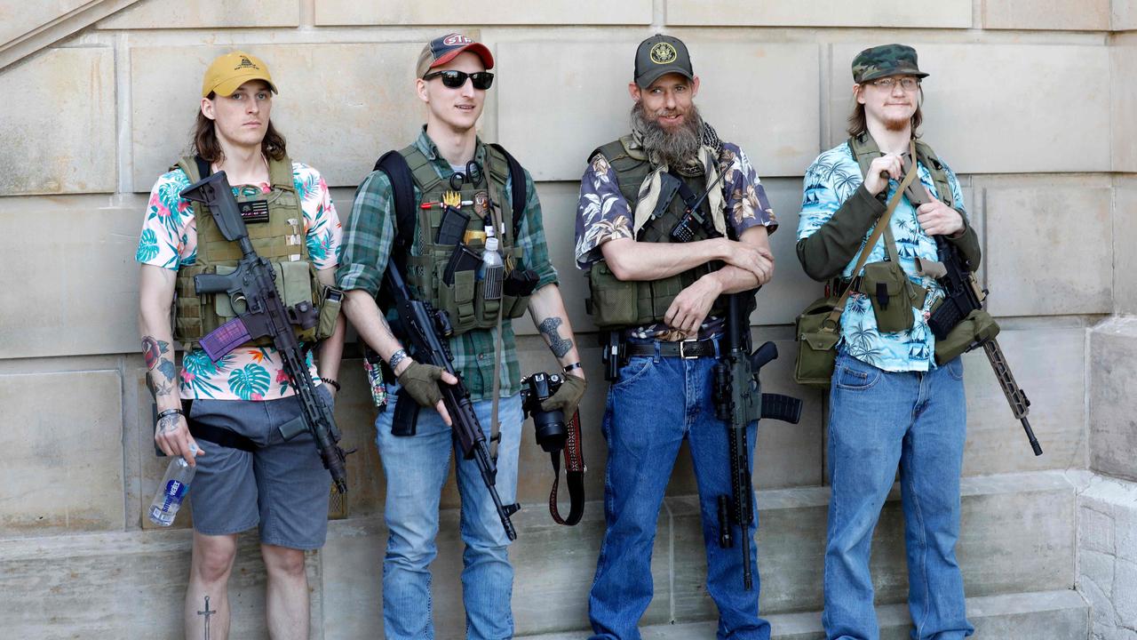 Some protesters in Michigan. Super keen on self-defence, these guys. Picture: Jeff Kowalsky/AFP