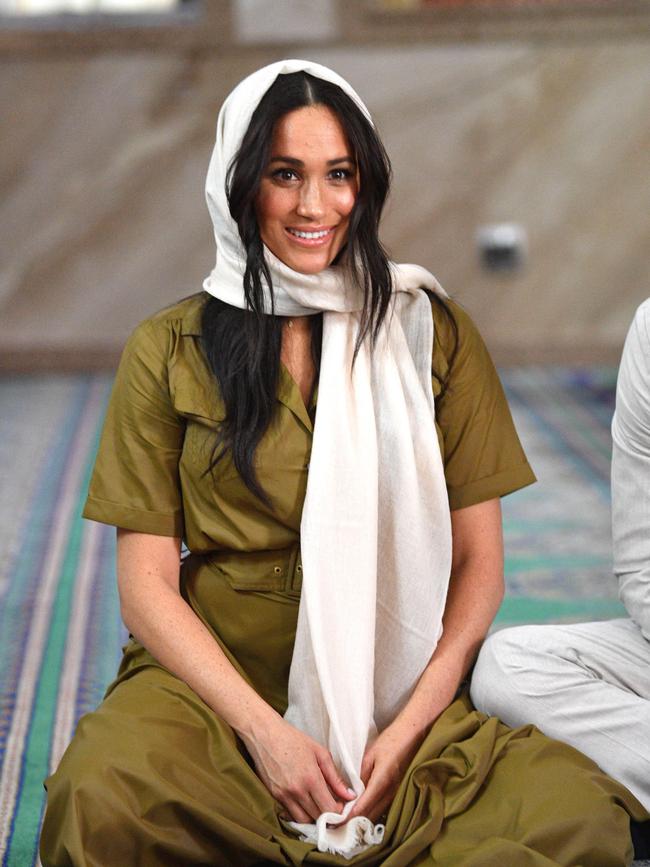 Meghan paired the dress with a headscarf while visiting the Auwal Mosque. Picture: Tim Rooke/Pool/Getty Images