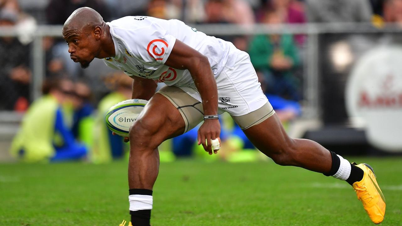 Sharks star Makazole Mapimpi runs in a try during the Super Rugby match.