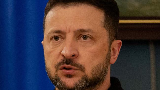 Ukraine's President Volodymyr Zelensky delivers a press conference in Kyiv on April 22, 2025, amid the Russian invasion of Ukraine. (Photo by Tetiana DZHAFAROVA / AFP)