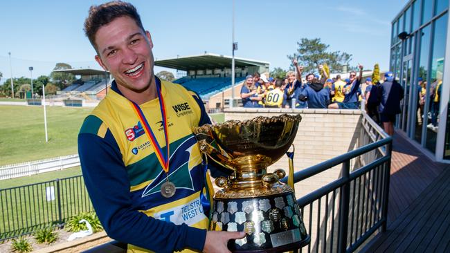 Eagles SANFL player Sam Lowson, celebrating with the cup. Picture Matt Turner.