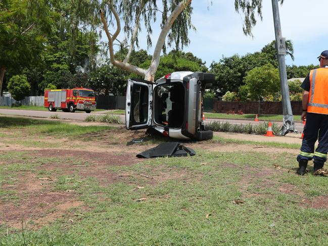 NT Police and Fire services attended a rolled vehicle at Nightcliff on Sunday. Picture: Sam Lowe