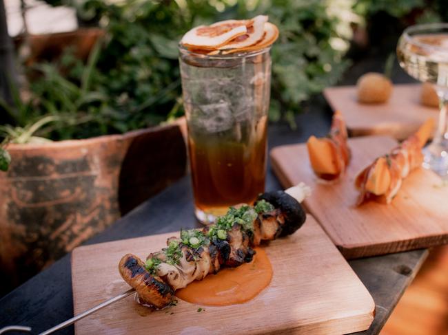 The pork, garlic, dried fig and apricot skewers, is one of the many dishes on offer at the newly re-opened In the Hanging Garden. Picture: ROSIE HASTIE/DARKLAB MEDIA