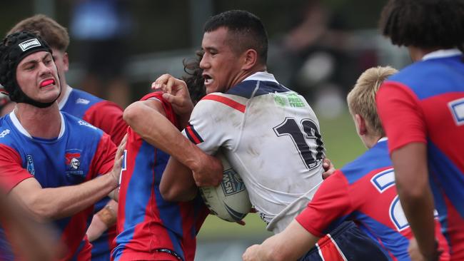 Josiah Fesolai with the ball. Picture: Sue Graham