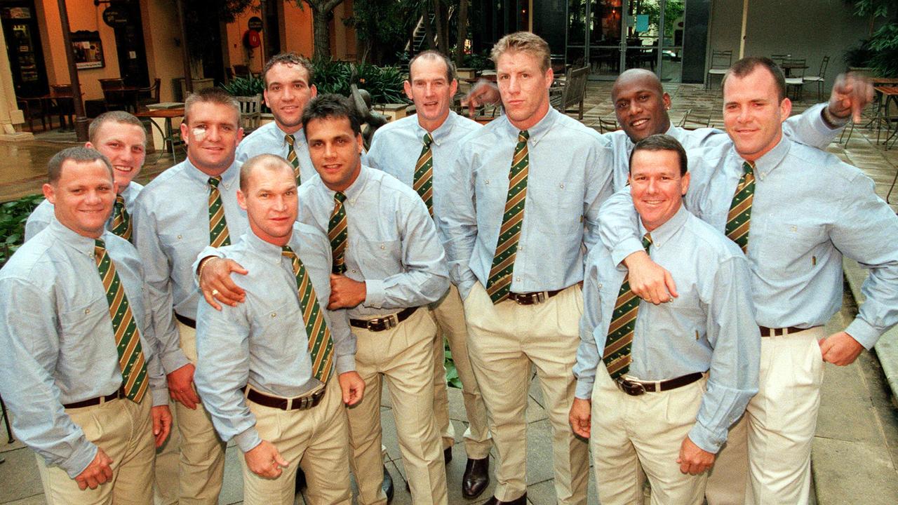 Wayne Bennett with a group of Broncos selected for the Test squad.