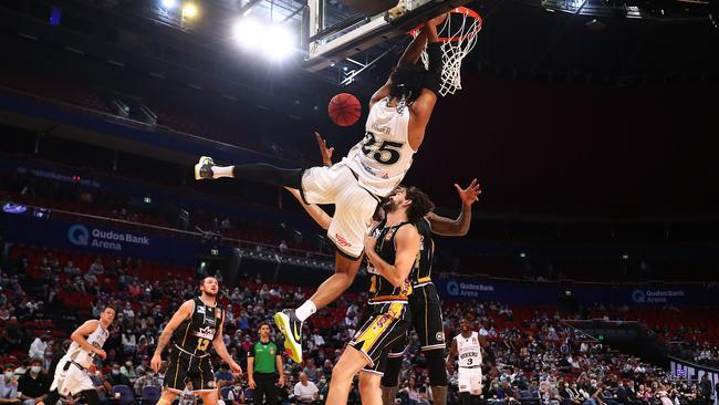 Keanu Pinder shows off his dunking skills. (Photo by Mark Metcalfe/Getty Images)