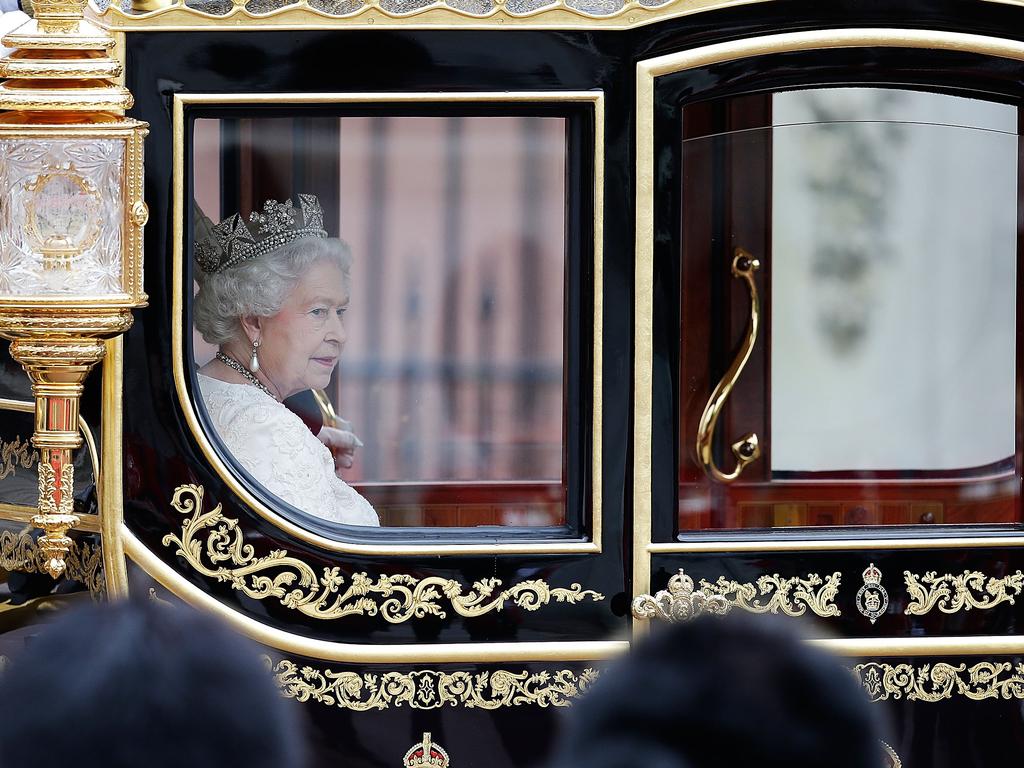 The late Queen Elizabeth II returns to Buckingham Palace in the Diamond Jubilee state coach following the State Opening of Parliament on June 4, 2014 in London, England. Picture: Matthew Lloyd/Getty Images)