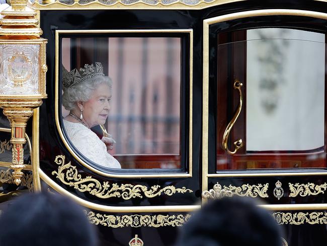 The late Queen Elizabeth II returns to Buckingham Palace in the Diamond Jubilee state coach following the State Opening of Parliament on June 4, 2014 in London, England. Picture: Matthew Lloyd/Getty Images)