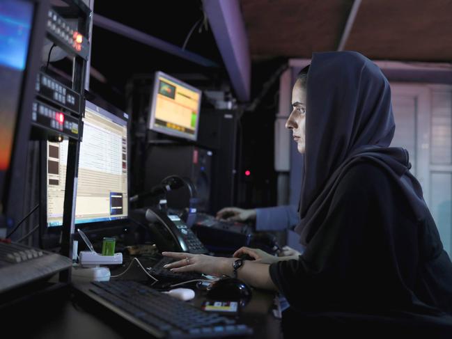 A female producer for Tolo News, Hela Mayar, works in a newsroom at Tolo TV station in Kabul, Afghanistan, May 22, 2022. REUTERS/Ali Khara