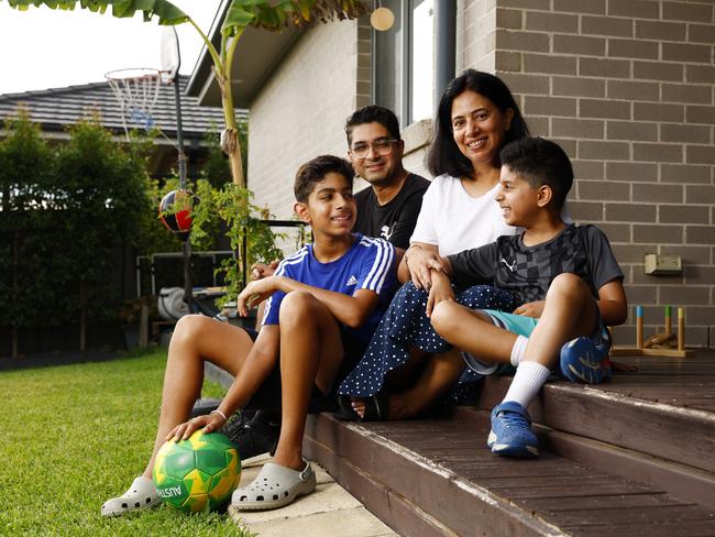 Aryan, 8, and Rishi, 12, often use the park near their home because they don't have a large backyard. Picture: Jonathan Ng