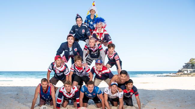 Robert Bruns, bottom far left, and young Roosters fans at Bronte beach. Pic: Monique Harmer.