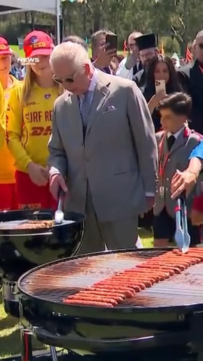 Charles and Camilla flip snags at Parramatta BBQ