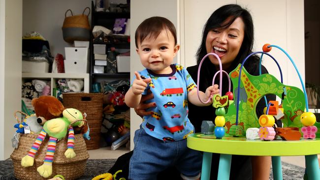 Dulwich Hill mum Jessamine Avila, with 10-month-old son Carter at home, can see the appeal of using a tidy technician. Picture: Toby Zerna