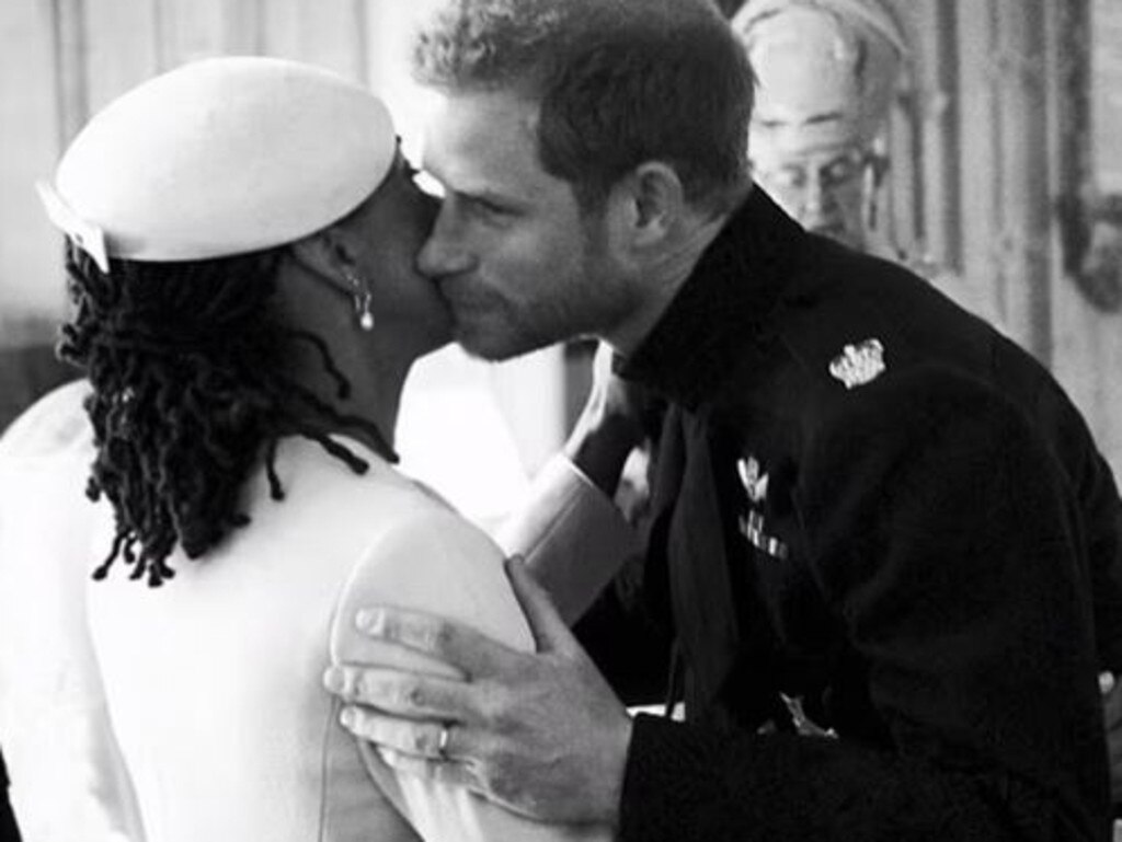 Prince Harry kisses Doria Ragland. Picture: Supplied