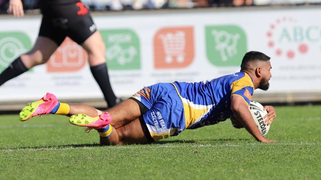 St Patricks fullback Raphael William-Joseph dives over. Picture: Steve Montgomery