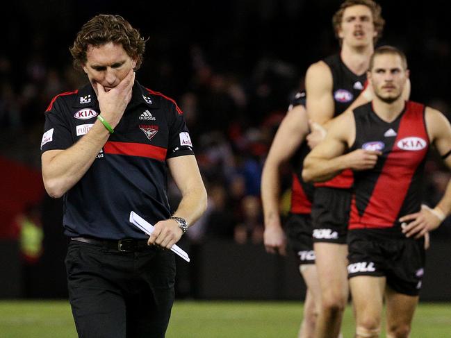 AFL Round 14 - Essendon v St Kilda at Etihad Stadium , Melbourne. Coach James Hird and players walk off after the loss. 5th July 2015. Picture: Colleen Petch.
