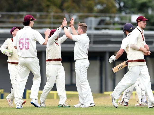 Fitzroy Doncaster celebrate a wicket. Picture: David Smith