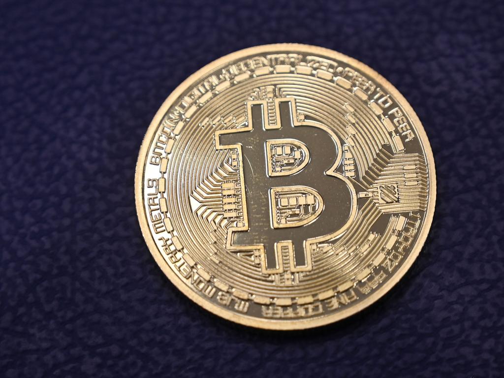 A Sydney lawyer has faced court over his alleged involvement in a cryptocurrency scam. Photo: Ozan KOSE/AFP.