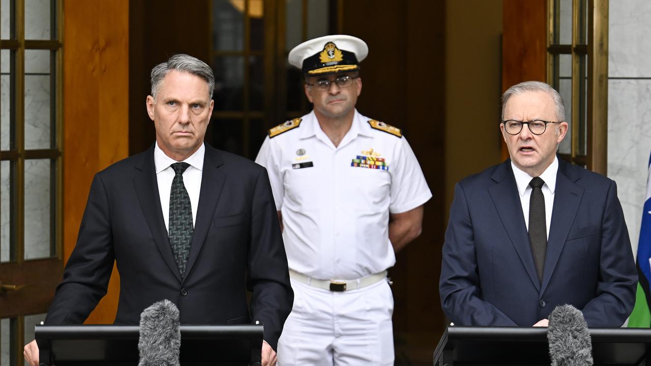 Prime Minister Anthony Albanese, Deputy Prime Minister and Minister for Defence, Richard Marles and Deputy Chief of the Royal Australian Navy, Rear Admiral Jonathan Earley. Picture: NCA NewsWire / Martin Ollman