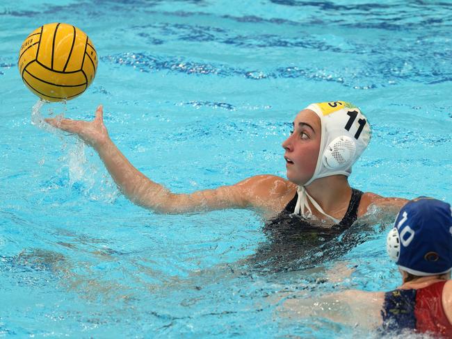 Under 19 Australian Water Polo Championships - Saskia Dunn of the Youth Barbarians under pressure from Nicolette Miller of South Australia on Saturday, December 10, 2022 in St Kilda East, Victoria, Australia.