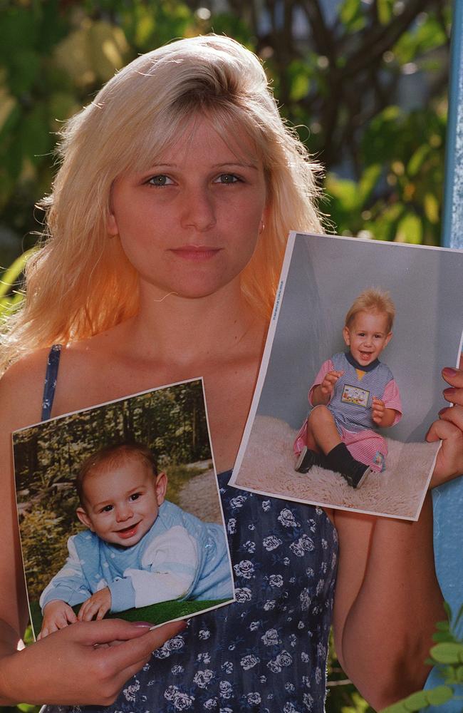 Virginia Homer with pictures of son Paul, beaten to death by his father.