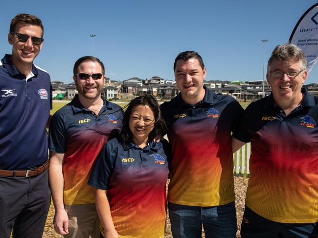 Members of the St Clair Crows AFL club with AFL NSW/ACT’s local area manager for Penrith, Blue Mountains and Hawkesbury, Michael Collins. Picture: KJR Productions.