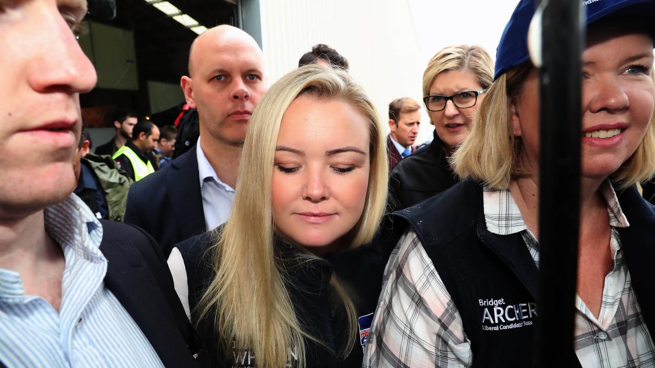 Jessica Whelan was whisked away by Liberal staff to a waiting car to avoid the media. Picture: Gary Ramage