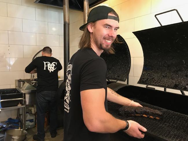 Andy Nielsen works the grill.