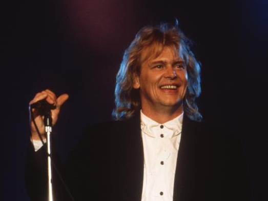 John Farnham is recovering at home in good spirits. Picture: Supplied