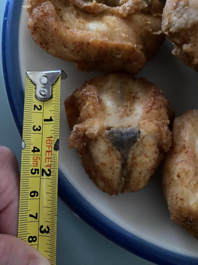 The disappointed customer measured the chicken piece at ‘two inches’. Picture: Reddit