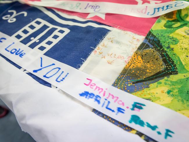 A message written on a white ribbon by Samantha's daughter Jemima. Picture: Jake Nowakowski