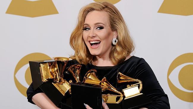 LOS ANGELES, CA - FEBRUARY 12: Singer Adele, winner of six GRAMMYs, poses in the press room at the 54th Annual GRAMMY Awards ...