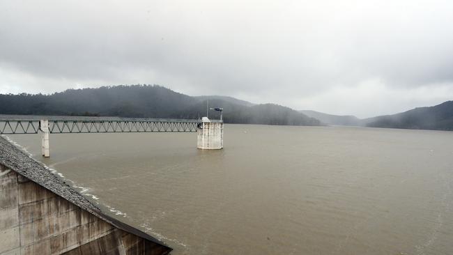 Hinze Dam when it was overflowing. The dam is currently at 83 per cent. Picture: Richard Gosling