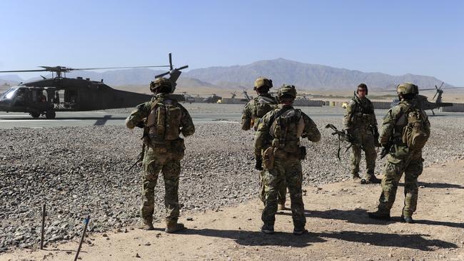 Australian Special Operations Task Group soldiers prepare to board a helicopter during the Afghanistan war. Picture: Defence