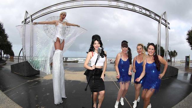 Stephanie Long as Amy Winehouse (centre)  , Alyssa Morgan - Showgirl Glamazon on stilts (left) and Paula McGregor, Mandy Woodend and Lea Armstrong from the Beehives (right) preparing for Viva in Surfers ParadisePhotograph : Jason O'Brien. Picture: GCB - Jason O'Brien