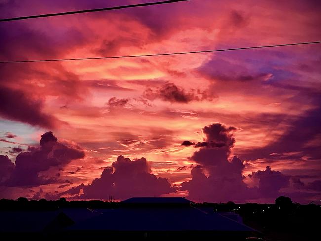 The sky above Eaton ignites in shades of red as the sun sets in a classic NT display. Picture: Matty Schiller