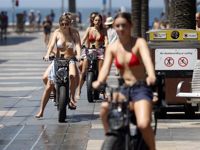 E-bikers on The Corso, Manly. Picture: Richard Dobson