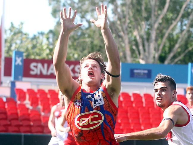 Jack Mentha goes for a mark playing for Gold Coast in the NEAFL. Photo by Richard Gosling