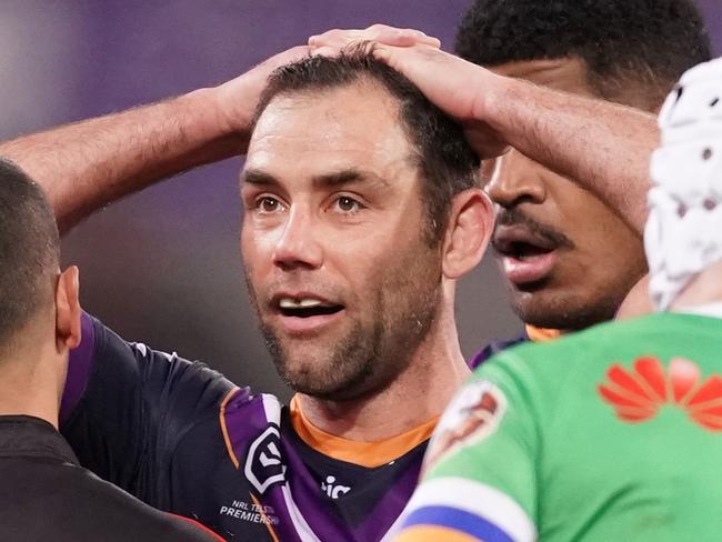 Cameron Smith of the Melbourne Storm watches the replay  on the big screen after Suliasi Vunivalu of the Melbourne Storm was called out by the touch judge in the final minutes during the NRL Second Qualifying Final match between the Melbourne Storm and the Canberra Raiders at AAMI Park in Melbourne, Saturday, September 14, 2019.  (AAP Image/Scott Barbour) NO ARCHIVING, EDITORIAL USE ONLY