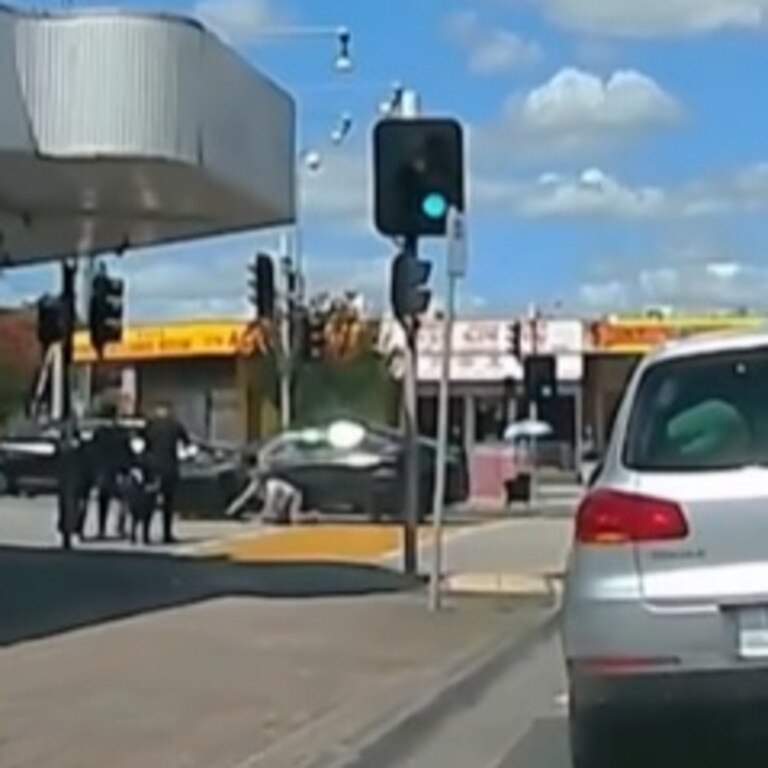 The woman is knocked down by a driver who appears to run a red light. Picture: Supplied