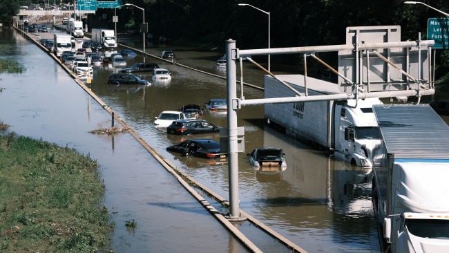 Hurricane Ida caused chaos in the northeast of the United States as record rain fell in parts of New York, forcing people to abandon their cars on the highway as flood water rose. Picture: Spencer Platt/Getty Images