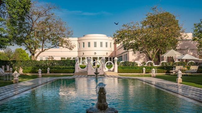 Alongside Rajmahal Palace is the neighbouring Art Deco apartment and pool book-ended by fountains.