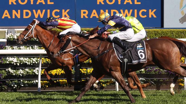 Nature Strip holds off Masked Crusader and Eduardo to win The Everest, which was the highest rating race of the spring. Picture: AFP